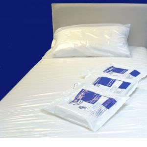 Waterproof EVA Single Mattress Cover on a bed with packaging